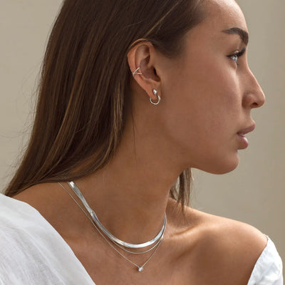 Uli - Boucle d'Oreille Croisée Acier Inoxydable
