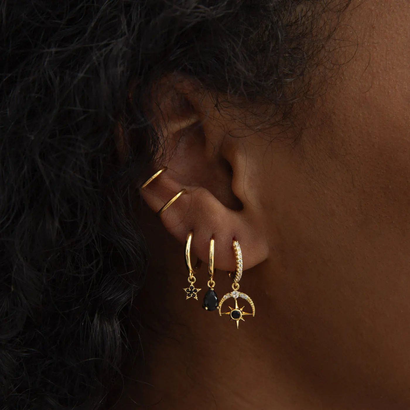 Elvira - Boucles d'oreilles créoles étoile en cristal