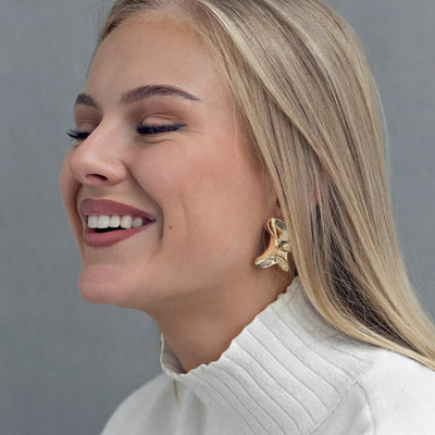 Boucle d'oreille tendance fondue