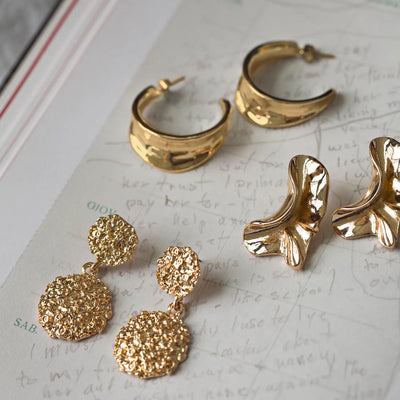 Boucle d'oreille tendance fondue