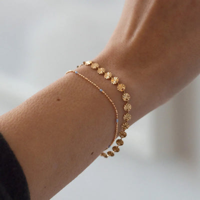 Bracelet plaque soleil brillant